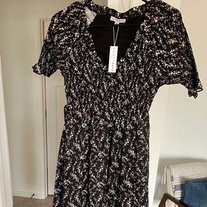 New with tags, Baltic Born XS. Lotta Black Floral Smocked Dress.